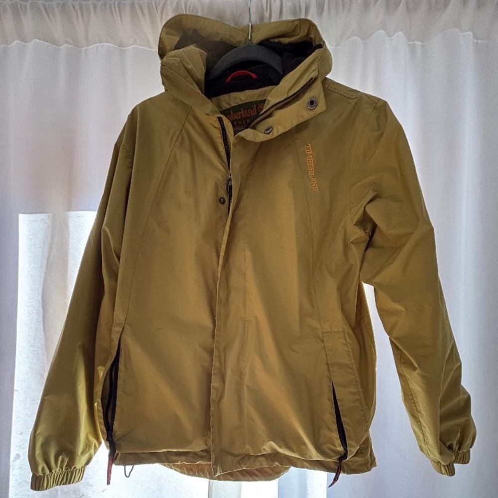 Timberland Rain Jacket Unisex XS, Zipper pockets, hooded, inside pockets.